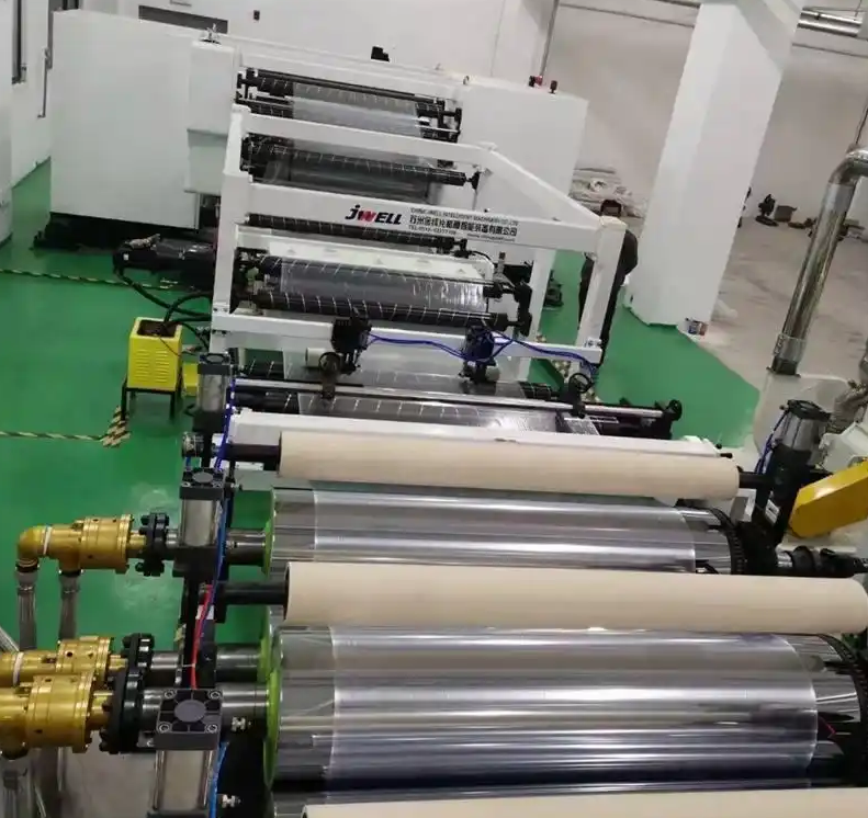 ماكينة بثق الصفيحة غير المرئية من مادة TPU من Jwell ماكينة بثق الصفيحة التقويمية من مادة TPU